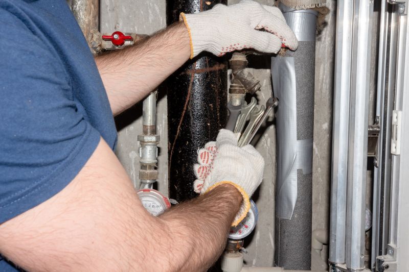 Plumber Installing Pipe