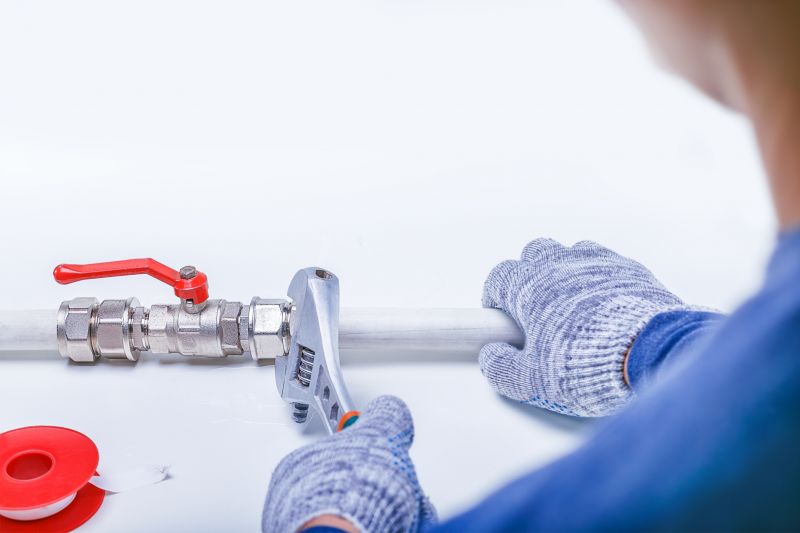 Plumber with Pipe Fittings